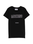 T-shirt per bambina Moschino Kids nera con logo in strass - Rubino Kids