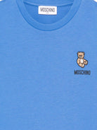 T-shirt per bambini Moschino Kids azzurro con applicazione Teddy Bear - Rubino Kids