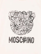 T-shirt per bambini Moschino Kids beige con stampa grafica - Rubino Kids