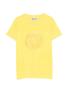 T-shirt per bambini Moschino Kids gialla con logo a spirale sul davanti - Rubino Kids