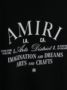 T-shirt per bambino Amiri Kids nero con stampa con logo sul davanti - Rubino Kids