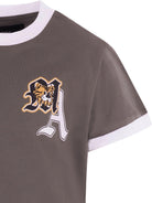 T-shirt per bambino Amiri Kids verde con logo sul davanti - Rubino Kids