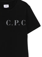T-shirt per bambino C.P. Company Kids nera con logo sul davanti - Rubino Kids