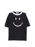T-shirt per bambino Moschino Kids nera con stampa smile sul davanti - Rubino Kids