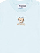 T-shirt per neonati Moschino Kids azzurra con dettagli ricamati - Rubino Kids