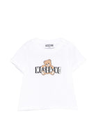 T-shirt per neonati Moschino Kids bianca con logo sul davanti - Rubino Kids