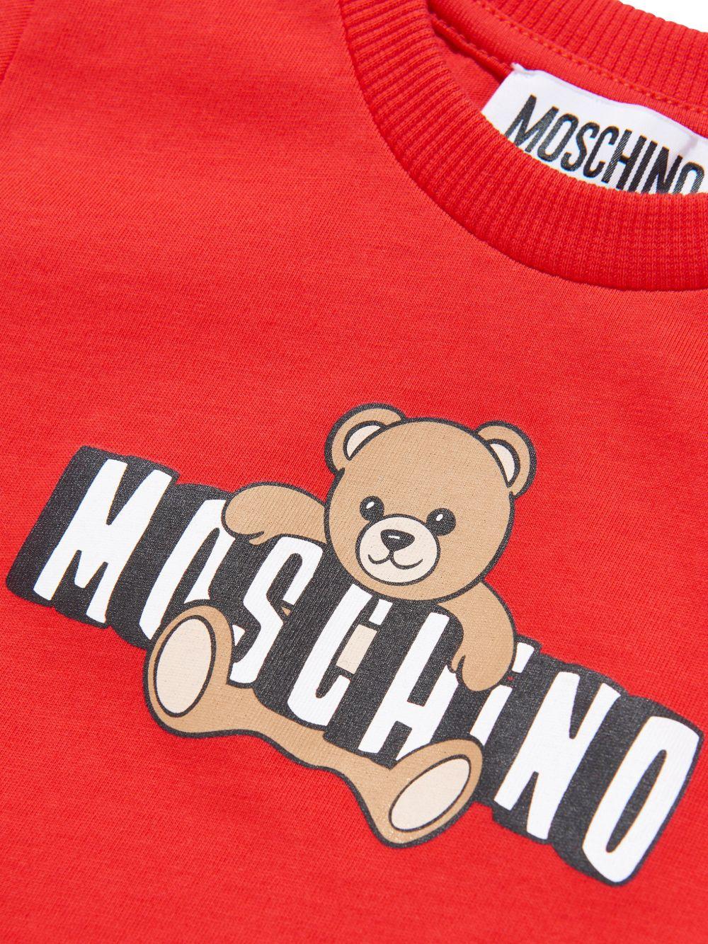T-shirt per neonati Moschino Kids rossa con logo sul davanti - Rubino Kids