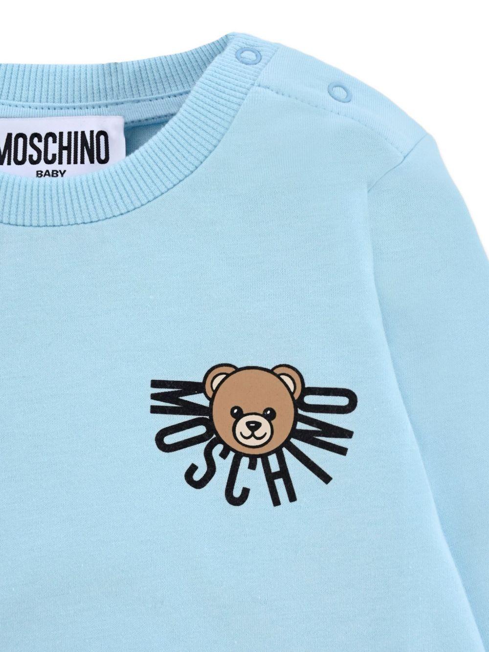 T-shirt per neonato Moschino azzurra con logo sul davanti - Rubino Kids
