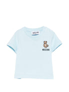 T-shirt per neonato Moschino Kids azzurra con ricamo Teddy Bear - Rubino Kids