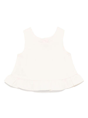 Donsje Francise white baby girl top with ruffled hem