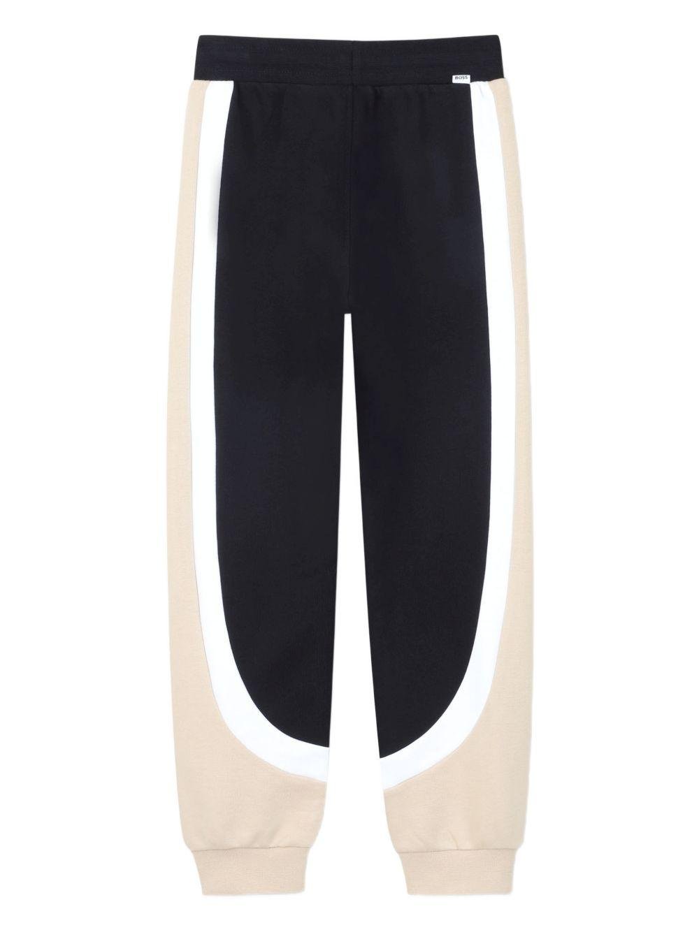 Tuta sportiva per bambino Boss Kidswear nera con design color - block - Rubino Kids