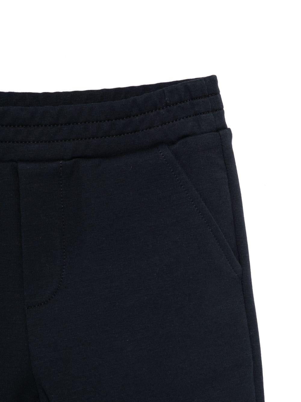 Tuta sportiva per neonato Moncler Enfant blu con chiusura frontale con zip - Rubino Kids