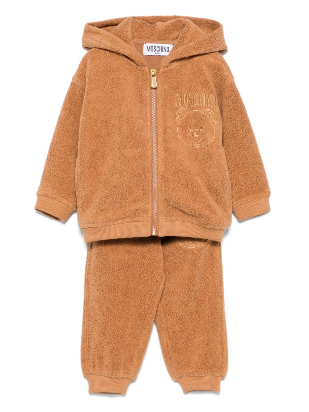 Tuta sportiva per neonato Moschino Kids beige con logo sul petto - Rubino Kids