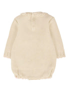 Tutina per neonata Paz Rodríguez beige con decorazione con fiocco - Rubino Kids