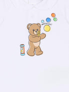 Tutina per neonati Moschino Kids bianca con stampa grafica Orsetto con bolle di sapone - Rubino Kids