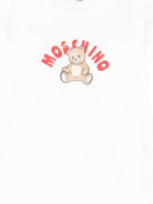 Tutina per neonati Moschino Kids bianca con stampa grafica Teddy Bear - Rubino Kids