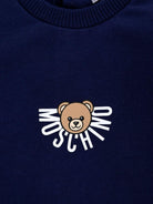 Tutina per neonati Moschino Kids blu in cotone con stampa teddy - Rubino Kids